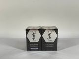 two small boxes of ysl cosmetics on a white surface
