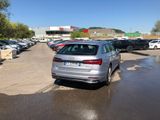many cars parked in a parking lot in a parking lot