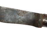 a large knife with a wooden handle on a white surface