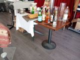 a table with bottles of alcohol on it in a living room