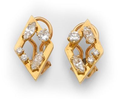 an image of a pair of gold and diamond earrings