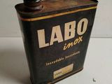 an old metal can that has a label on it