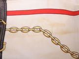 a picture of a purse with a chain on it