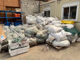 a pile of bags that are sitting on a pallet