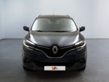 the front view of a black car in a white room