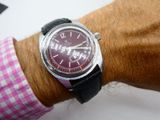 a close up of a wrist with a watch on it