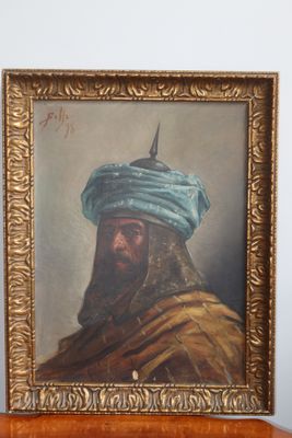 painting of a man in a turban and a blue turban