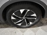 a close up of a car tire on a tile floor