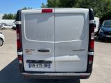 a white van that is parked in a parking lot