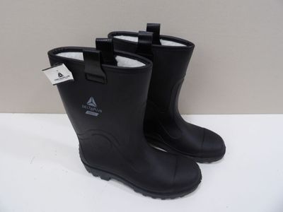pair of black rubber boots on a white surface