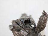 a close up of a metal object with a hole in it