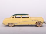 yellow toy car with a surfboard on top of the roof