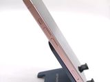 a close up of a cell phone on a stand