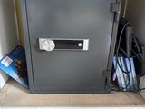 a safe box that is open on the floor