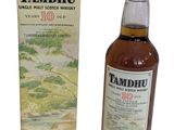 the bottle of tamdhu is next to the box