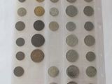 a lot of coins in a plastic bag on a table