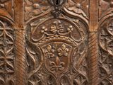 an old wooden chest with carvings and carvings on the sides