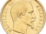 une image montrant un gros plan d'une pièce d'or sur laquelle figure le visage d'un homme