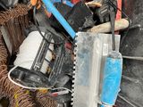 a pile of tools in the back of a truck