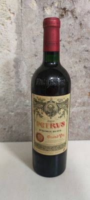 a bottle of wine that is sitting on a table