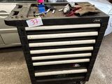 an image of a tool box with tools on top of it