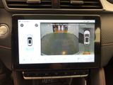 an image of a car dashboard with a tablet on it