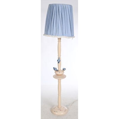 the lamp is made of wood and has a blue shade on it