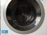 a washing machine that is sitting on the floor