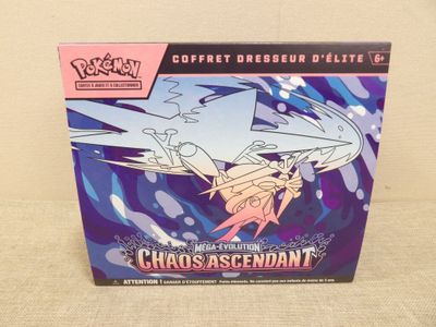 a close up of a box of pokemon cards on a table