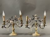 pair of antique brass candelabs with crystals and flowers