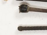 several different types of canes are lined up on a white surface