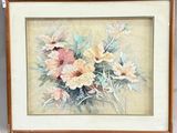 painting of a bouquet of flowers in a wooden frame on a wall
