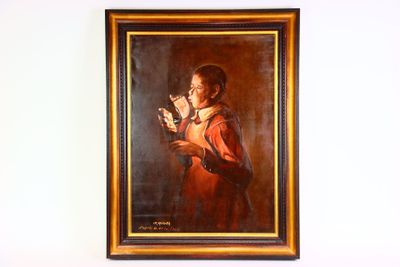 un tableau accroché au mur représentant un homme tenant un chat
