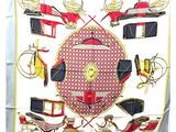 une photo d'une écharpe sur laquelle figure une image de une calèche
