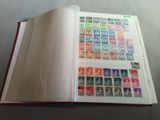 a book with a lot of stamps inside of it