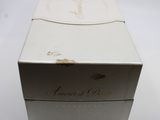an image of a white box with a brown label sitting on a table