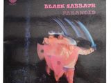 un album de Black Sabbath sur lequel figure la photo d'un homme tenant un couteau