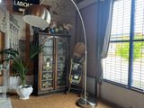 a living room with a couch and a large window