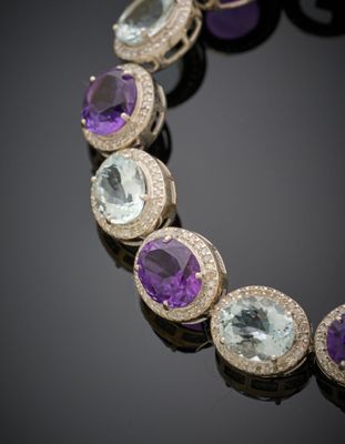 BRACELET en argent (925°/°°) articulé, serti d'améthystes et…
