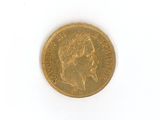 a gold coin with a picture of a woman on it