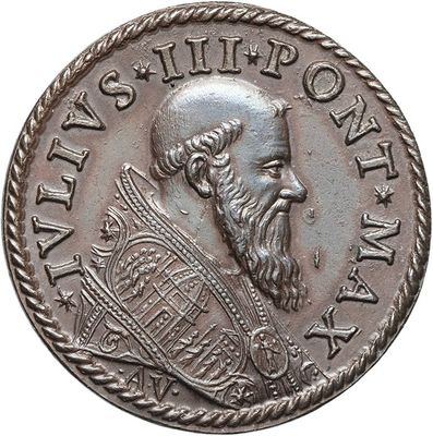 a close up of a coin with a man on it