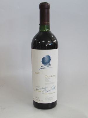 a bottle of wine that is sitting on a table