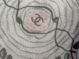 a picture of a drawing of a spiral with leaves on it