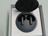 a box with a pair of earphones inside of it