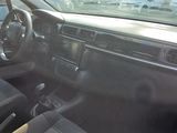 a picture of a car that is parked in a lot