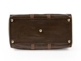 a brown leather purse on a white background