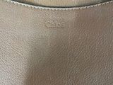 a close up of a purse with a zipper on it