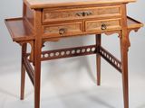 a small wooden table with a drawer underneath it