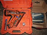 a box with a stapler and a stapler in it