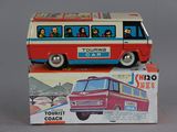 a toy bus that is sitting on top of a box